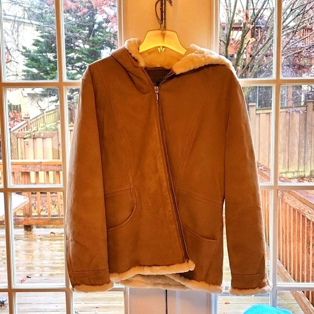 * Genuine Leather suede jacket fully lined with hood.